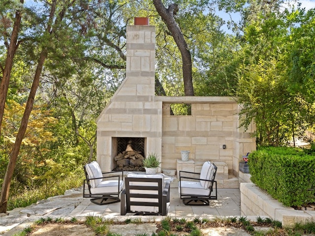 1200 Barton Creek Blvd Unit 35, Austin, TX 78735 - view of patio featuring an outdoor living space with a fireplace