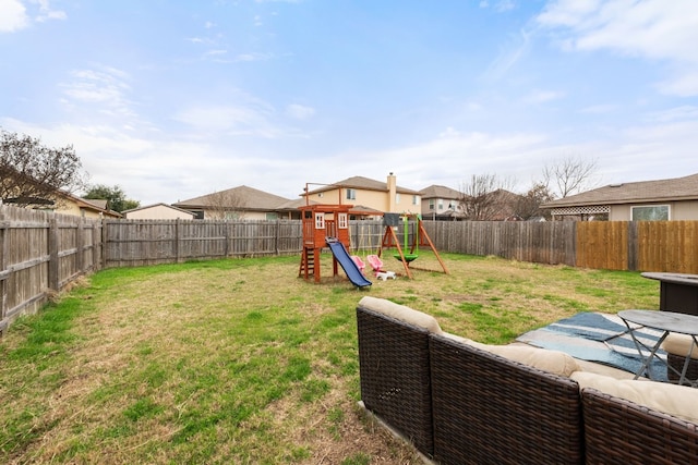 view of yard featuring an outdoor hangout area and a playground