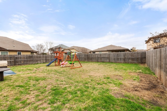 view of yard with a playground