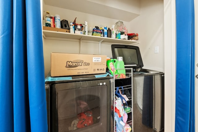 washroom with separate washer and dryer