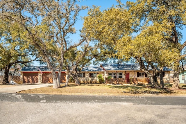 ranch-style home with a garage