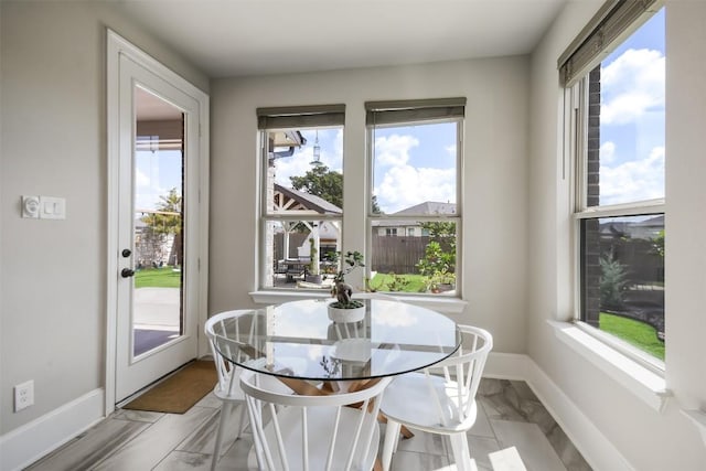 dining area featuring a wealth of natural light