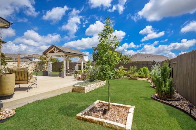 view of yard with a gazebo and a patio area