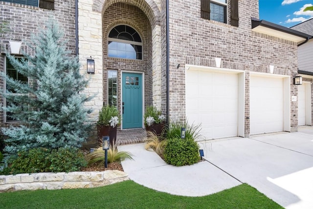 entrance to property featuring a garage