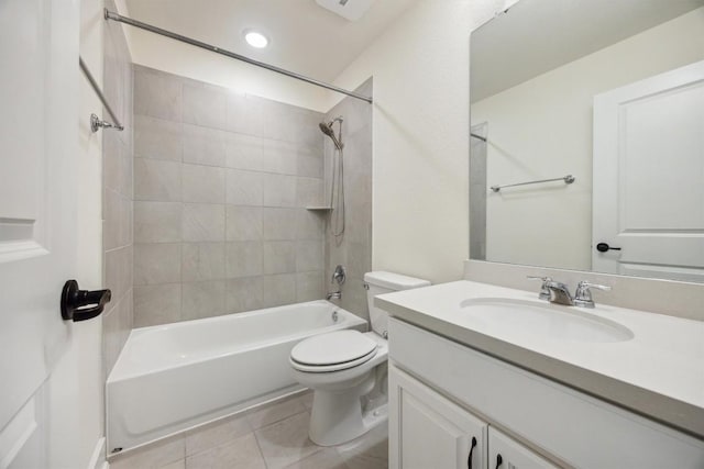 full bathroom with vanity, toilet, tiled shower / bath combo, and tile patterned flooring