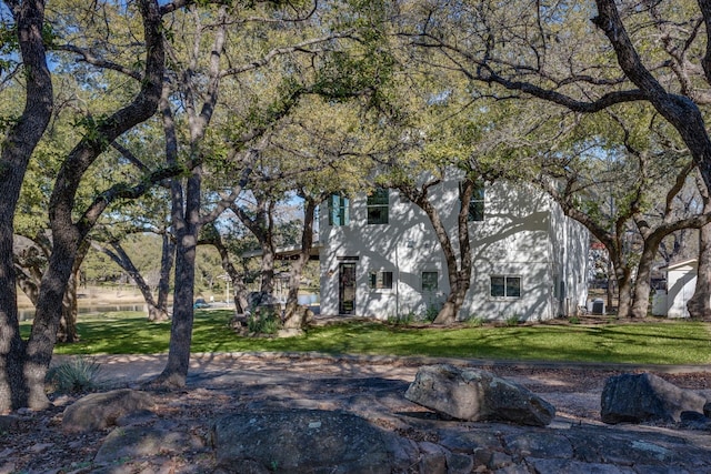 exterior space featuring a front lawn