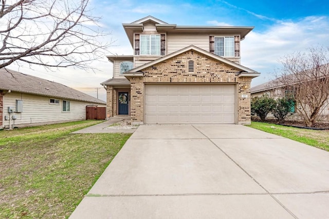 front of property featuring a garage and a front yard