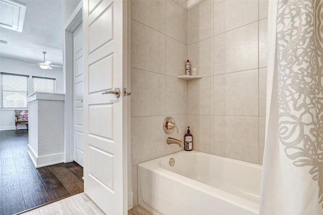 1801 Roseburg Dr Unit 29, Austin, TX 78754 - bathroom with hardwood / wood-style flooring, shower / tub combo with curtain, and ceiling fan