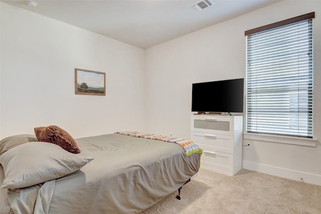 1801 Roseburg Dr Unit 29, Austin, TX 78754 - bedroom featuring light carpet