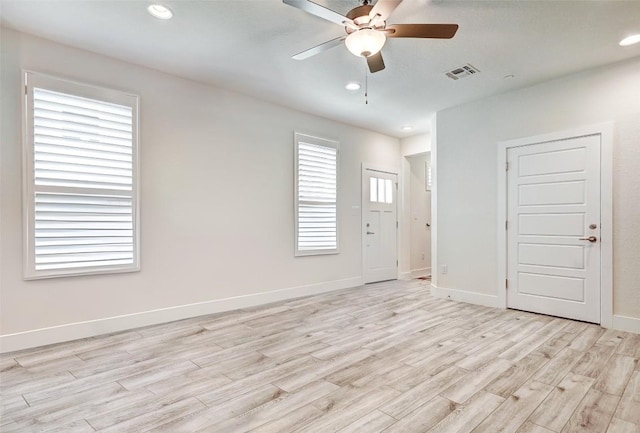 1801 Roseburg Dr Unit 29, Austin, TX 78754 - spare room featuring ceiling fan and light hardwood / wood-style floors