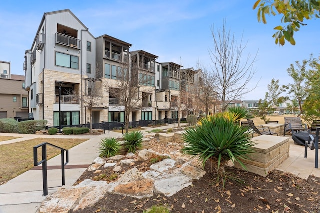 4510 Unity Cir Unit 258, Austin, TX 78731 - view of building exterior with a residential view