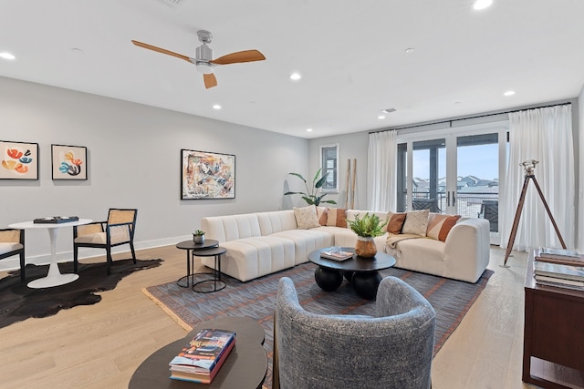 4510 Unity Cir Unit 258, Austin, TX 78731 - living room featuring recessed lighting, wood finished floors, a ceiling fan, and baseboards