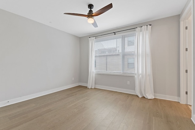 4510 Unity Cir Unit 258, Austin, TX 78731 - unfurnished room featuring ceiling fan, light wood-style flooring, and baseboards