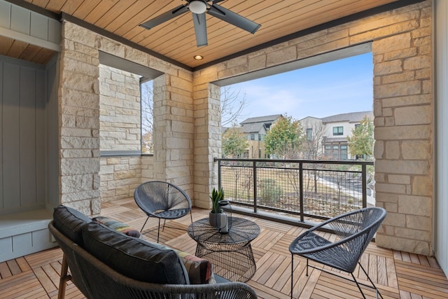 balcony featuring ceiling fan