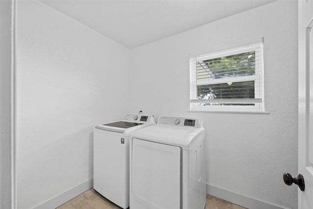 washroom featuring independent washer and dryer