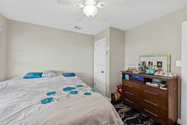 bedroom featuring ceiling fan