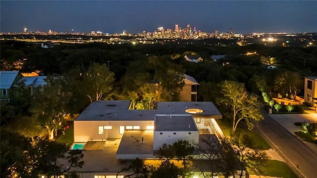 aerial view at twilight with a view of city lights