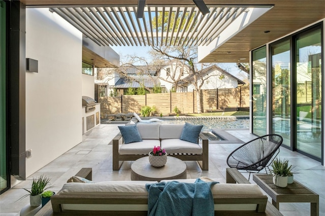 view of patio / terrace with an outdoor kitchen, an outdoor hangout area, grilling area, and a pergola