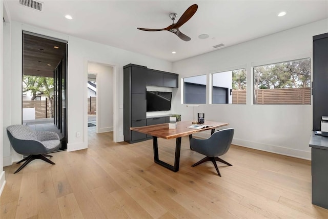 office with recessed lighting, visible vents, and light wood-style flooring