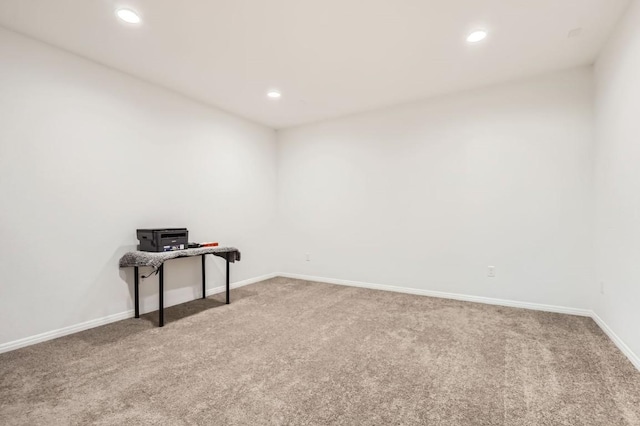 spare room featuring carpet floors