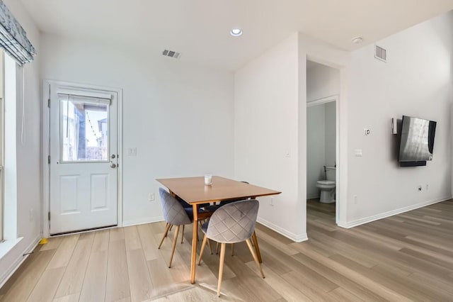 dining area featuring light hardwood / wood-style flooring