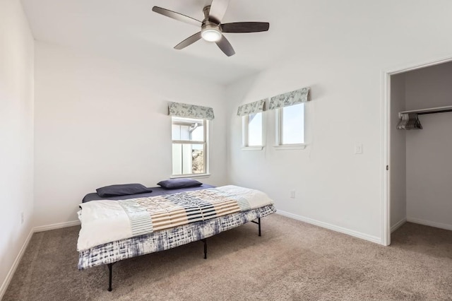 205 Audie Murphy Cir, Leander, TX 78641 - bedroom with carpet flooring, baseboards, a spacious closet, and ceiling fan
