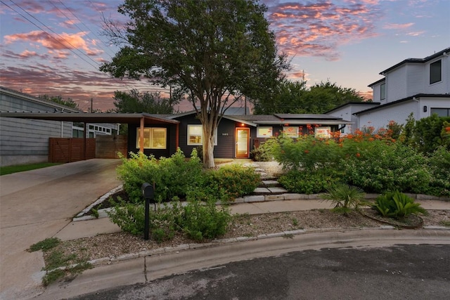 view of front of home featuring a carport