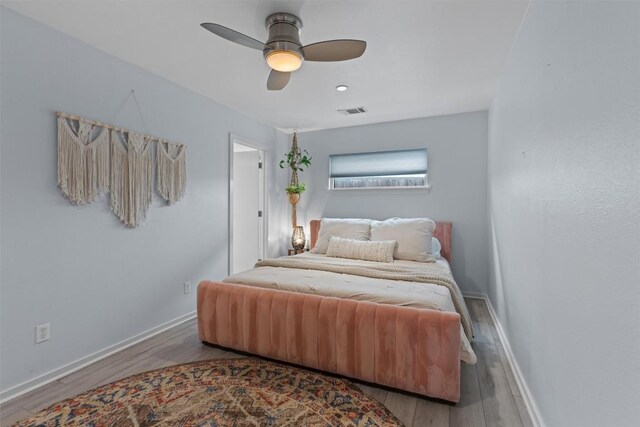 3601 Marcae Ct, Austin, TX 78704 - bedroom with wood finished floors, baseboards, and a ceiling fan