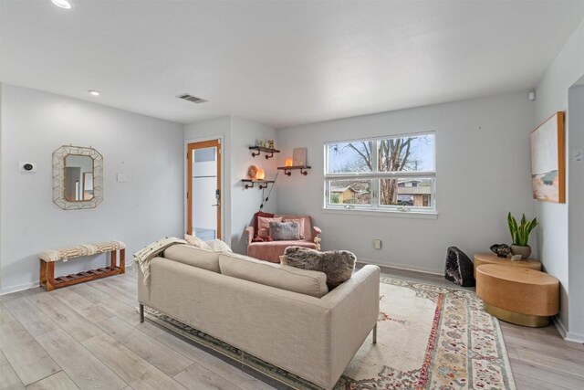 3601 Marcae Ct, Austin, TX 78704 - living area with light wood-type flooring, recessed lighting, and baseboards