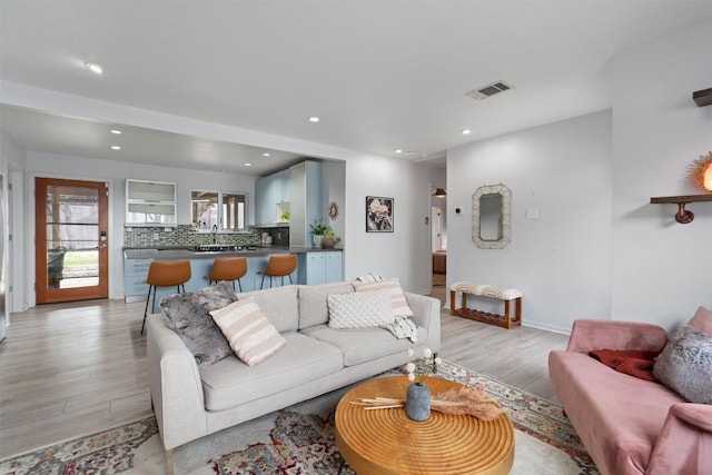 3601 Marcae Ct, Austin, TX 78704 - living area with light wood-style flooring and recessed lighting