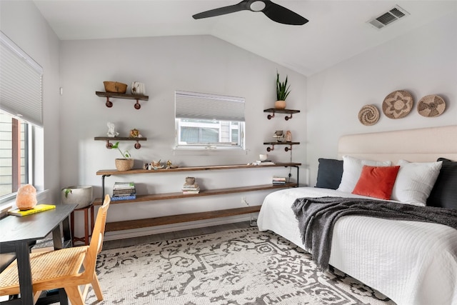 3601 Marcae Ct, Austin, TX 78704 - bedroom with lofted ceiling, wood finished floors, and a ceiling fan