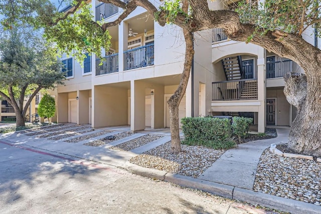9525 N Capital Of Texas Hwy Unit 625, Austin, TX 78759 - view of front of home with stucco siding and a balcony