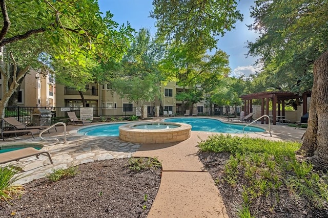 view of pool with a gazebo, a hot tub, and a patio