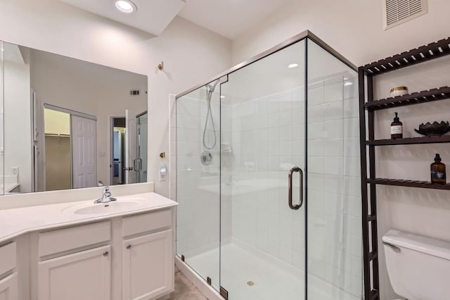 9525 N Capital Of Texas Hwy Unit 625, Austin, TX 78759 - full bath featuring vanity, a shower stall, and a closet