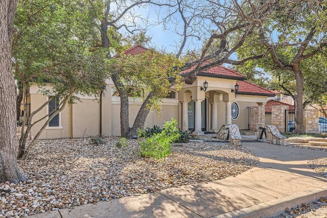 9525 N Capital Of Texas Hwy Unit 625, Austin, TX 78759 - view of front of home with stucco siding and a tile roof