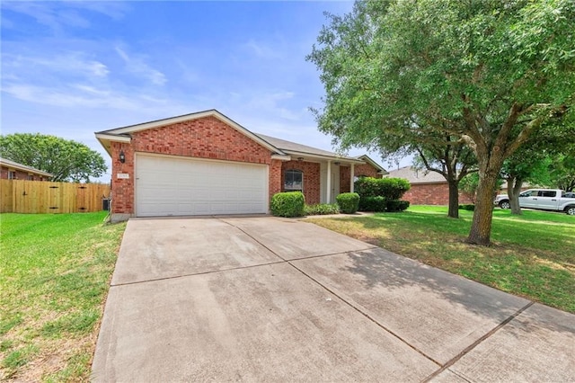 ranch-style house featuring a garage and a front lawn