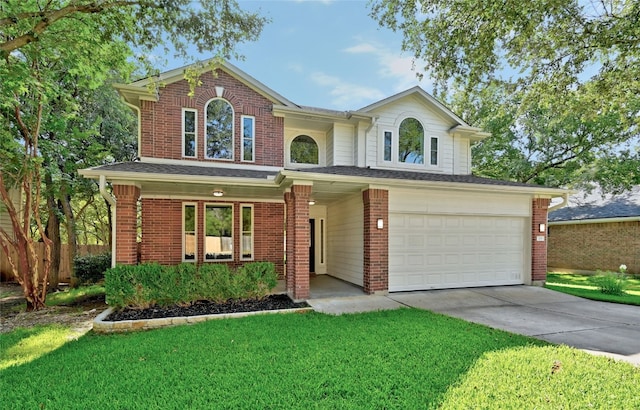 front of property featuring a garage and a front yard