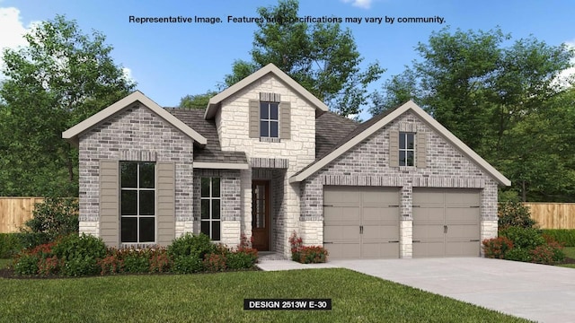 view of front of home featuring a garage and a front yard