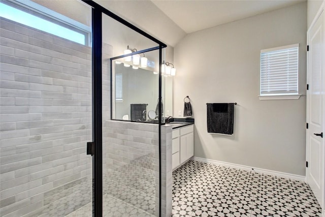 321 Dancing Oak Ln Unit 101, San Marcos, TX 78666 - bathroom featuring vanity, tile patterned floors, and a shower stall