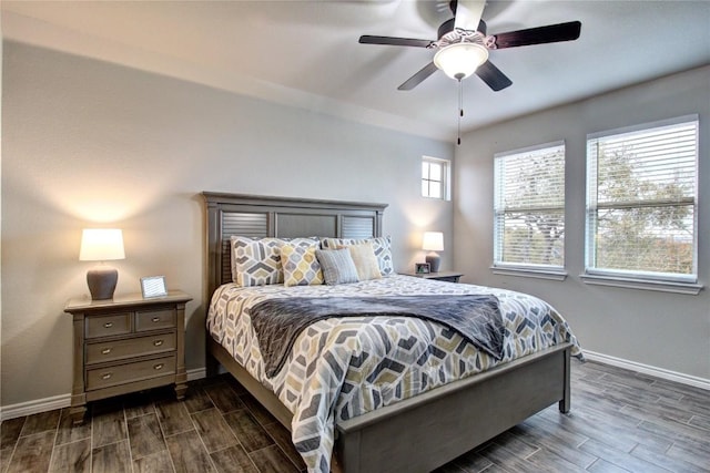321 Dancing Oak Ln Unit 101, San Marcos, TX 78666 - bedroom with wood tiled floors and a ceiling fan