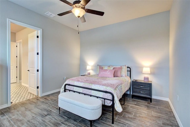 321 Dancing Oak Ln Unit 101, San Marcos, TX 78666 - bedroom featuring wood finish floors and a ceiling fan