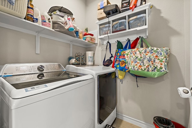 laundry area featuring independent washer and dryer