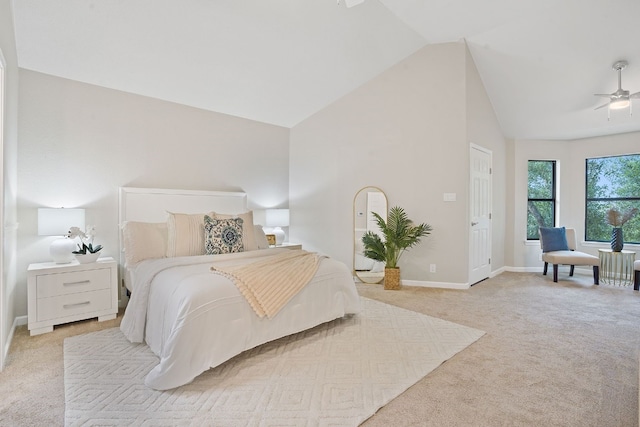 bedroom featuring vaulted ceiling and light carpet