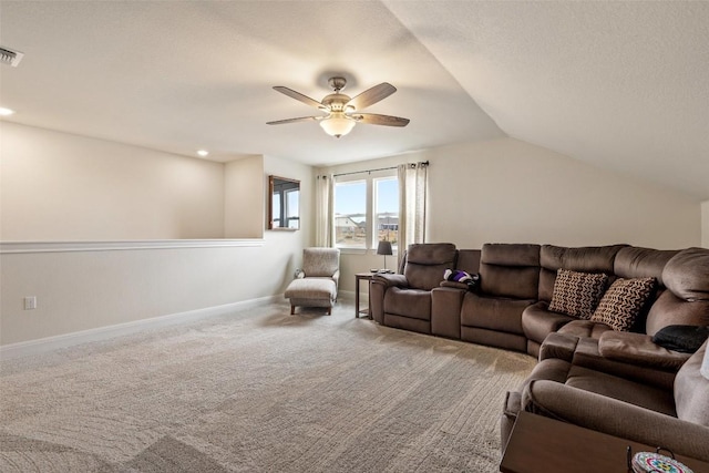 living room featuring lofted ceiling, carpet flooring, a textured ceiling, and ceiling fan