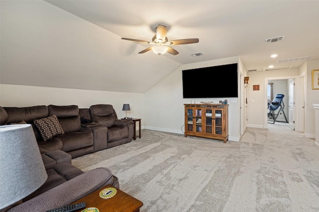 living room featuring ceiling fan, lofted ceiling, and light carpet