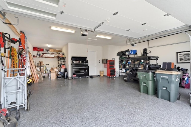 garage featuring a garage door opener