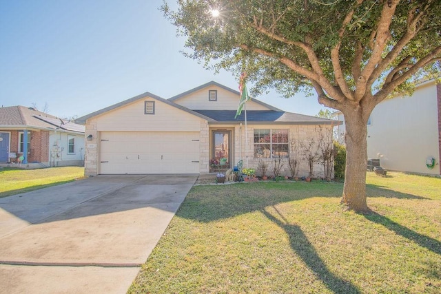 ranch-style home with a garage and a front lawn