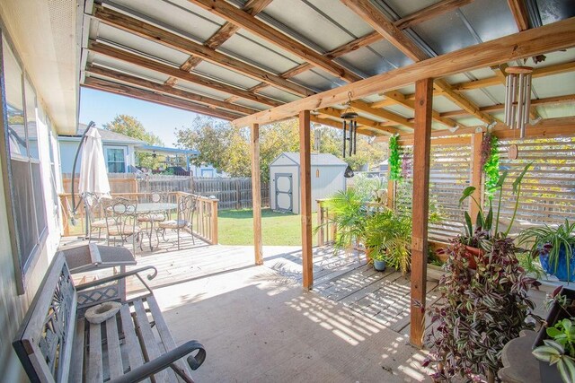 view of patio / terrace with a storage unit