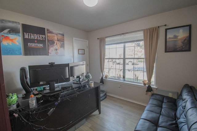 office space featuring light hardwood / wood-style floors