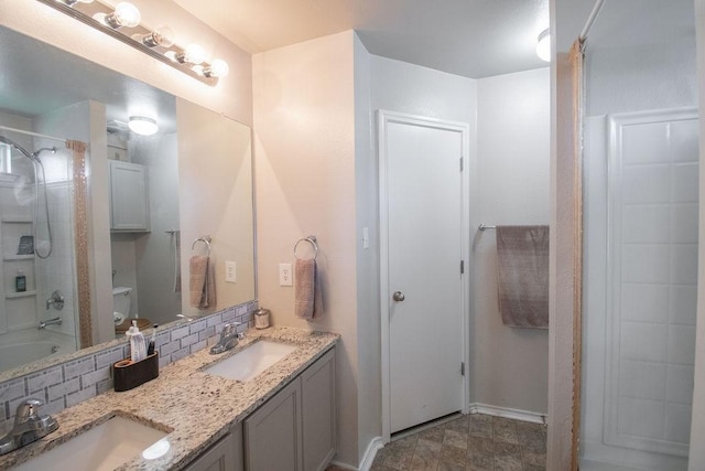 full bathroom featuring vanity, toilet, shower / tub combo with curtain, and decorative backsplash